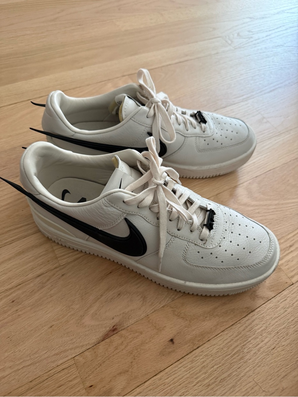 Nike Men’s White Sneakers with Black Swoosh